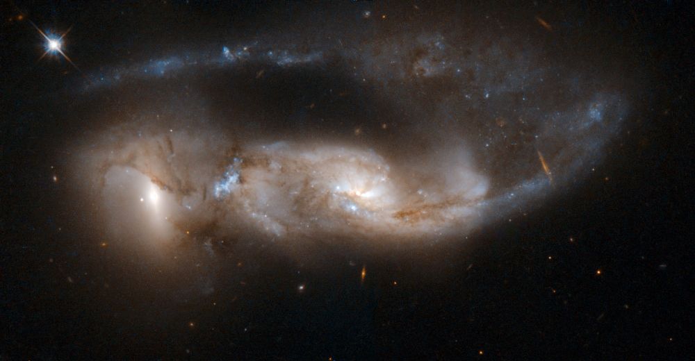 Arp 81, an interacting pair of galaxies NGC 6621 and NGC 6622, showcasing star formation and a tail from NGC 6621. Credit: NASA, ESA, the Hubble Heritage Team (STScI/AURA)-ESA/Hubble Collaboration and W. Keel (University of Alabama, Tuscaloosa)