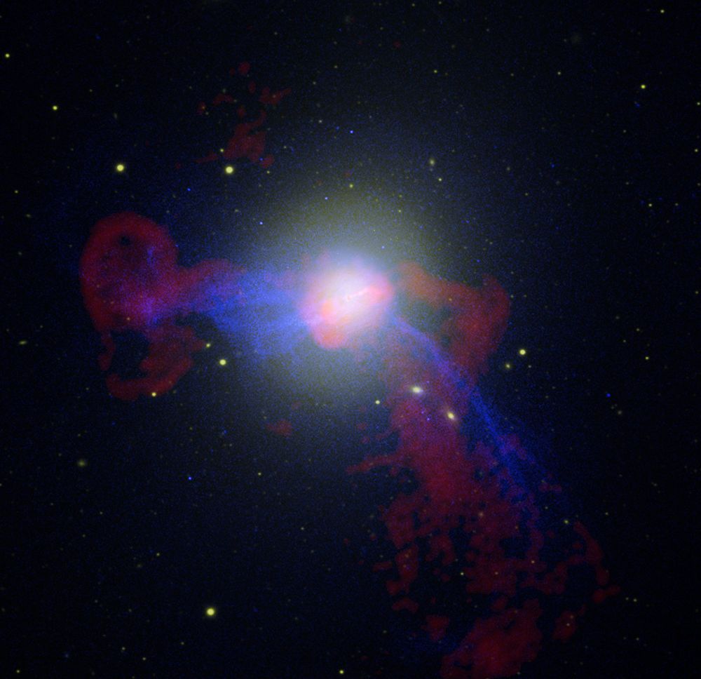 Composite image of the giant elliptical galaxy M87 showing jets from its central black hole in radio, X-ray, and optical wavelengths. Credit: Photo Credit: NASA, ESA, and Z. Levay (STScI)Science Credit: Radio: NRAO/AUI/NSF/W. Cotton; X-ray: NASA/CXC/CfA/W. Forman et al.; Optical:  NASA, ESA, and the Hubble Heritage Team (STScI/AURA),  and R. Gendler