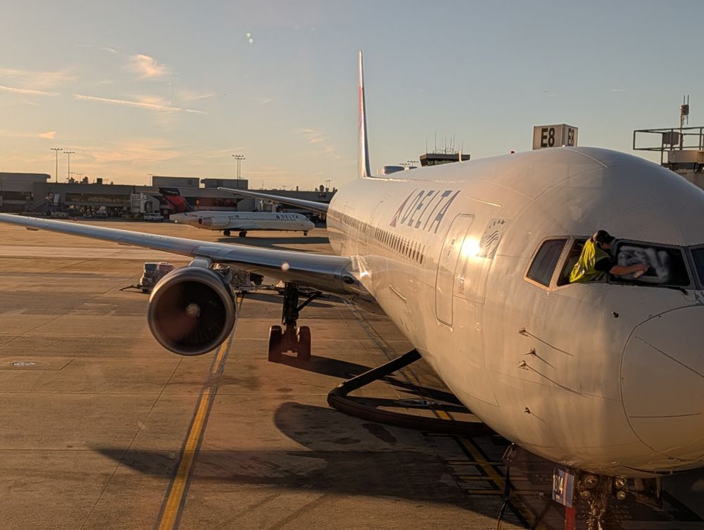 767-400ER with some window cleaning in progress.