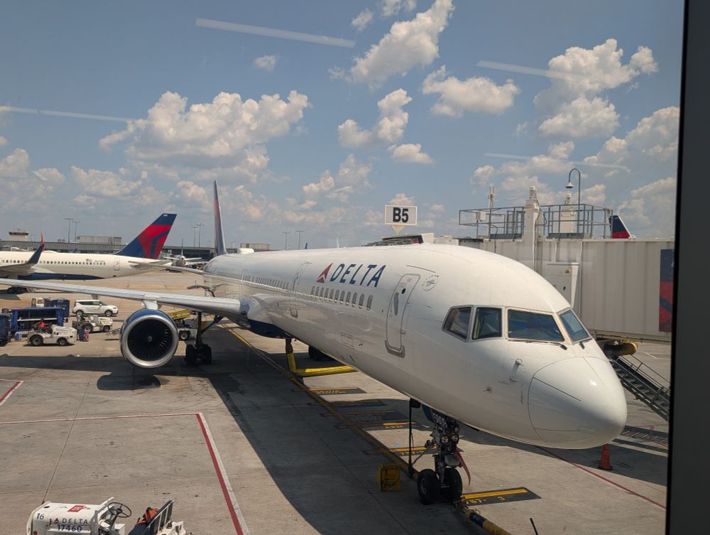 A Delta 757-300 parked at gate B5 in Atlanta.