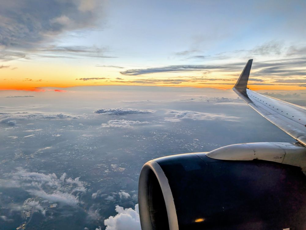 Sunrise over a 757 wing.