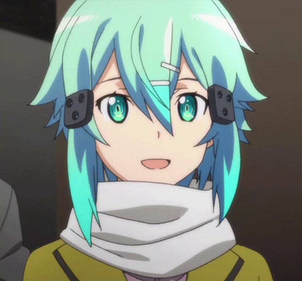 a close up of a girl with green hair and headphones on