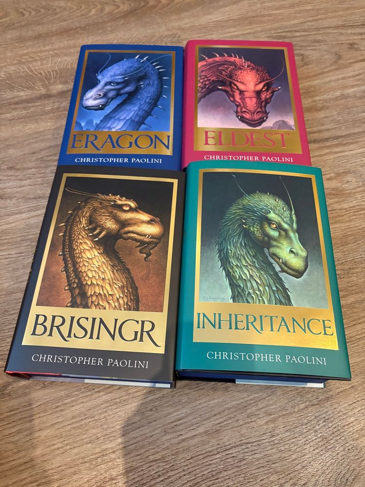 Four special edition hardbacks of Eragon, Eldest, Brisingr and Inheritance by Christopher Paolini