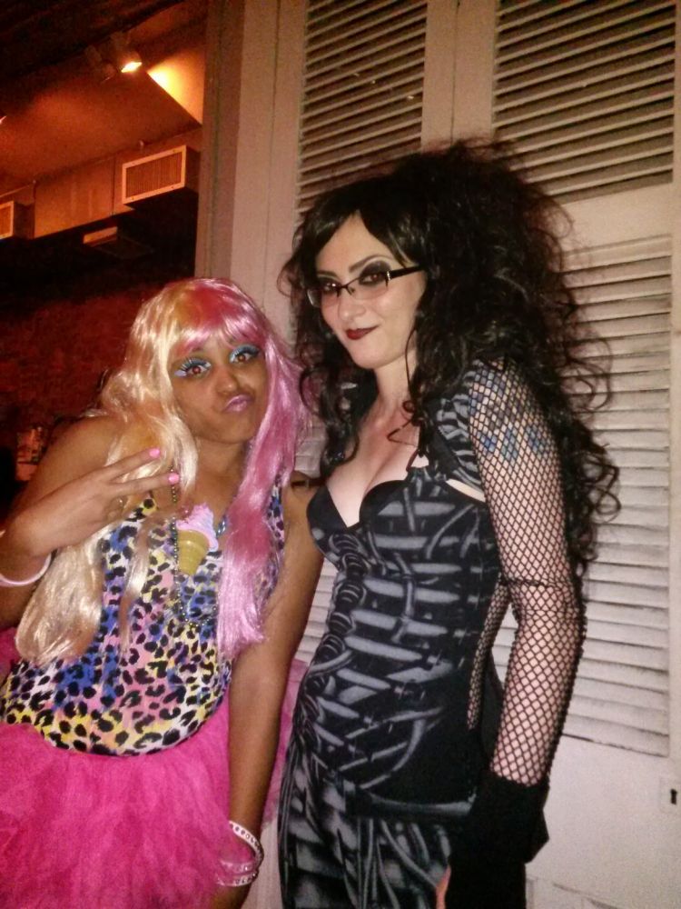 my friend dressed as a pink & purple nikki minaj and me lookin like some kind of biomechanical nightmare
