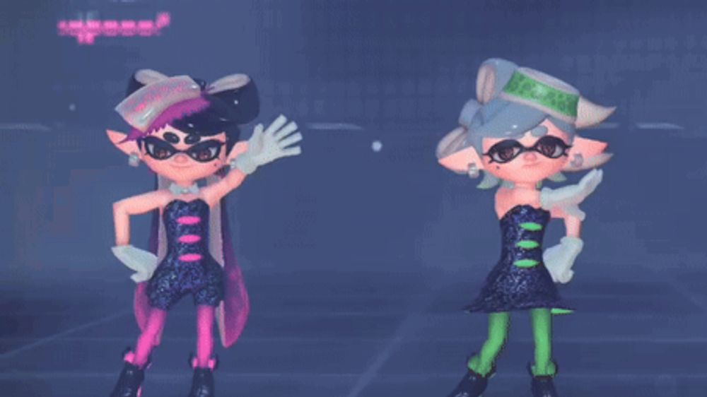 two squid girls are dancing together in a dark room