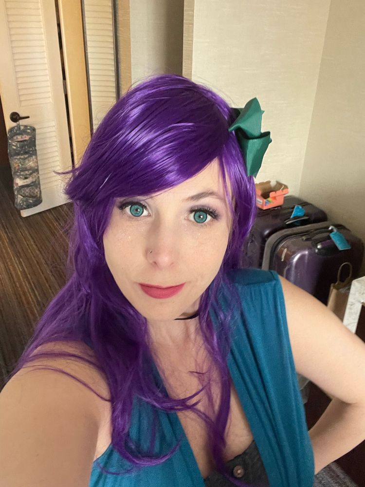 Cosplayer dressed as Abigail from Stardew Valley