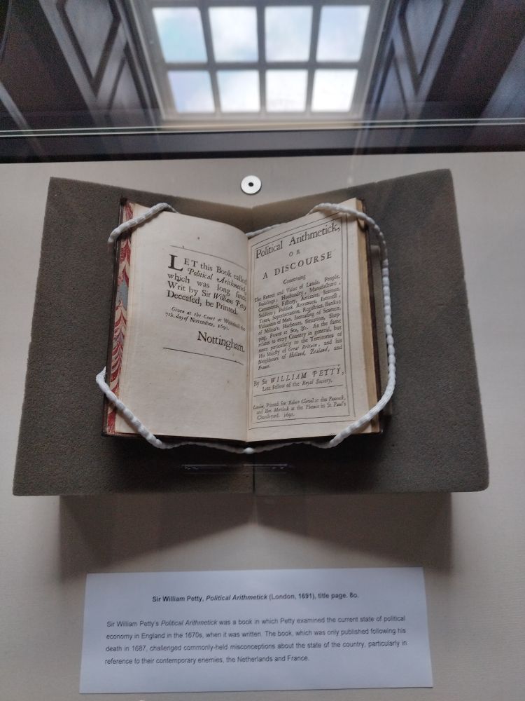 Book open for an exhibition on William Petty