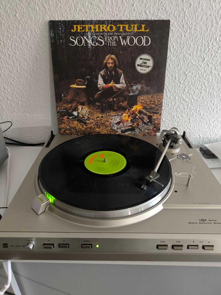 album cover standing on a turntable