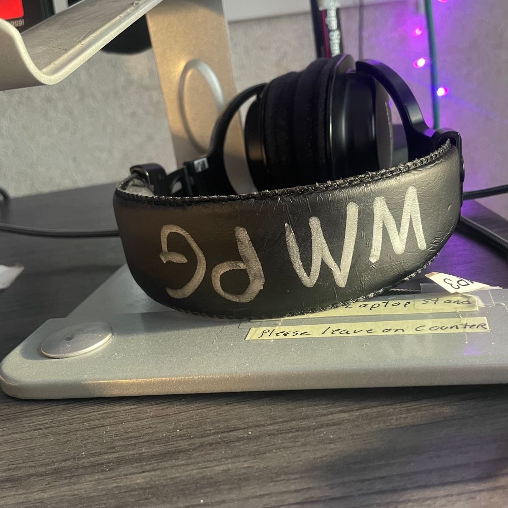 headphones with WMPG written on the band 