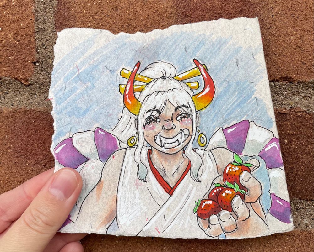 Traditional art made with pen, copic markers, and white out. It’s Yamato from One Piece. A wide grin is on his face and his underbite fangs are visible. He’s holding out strawberries for you to take.