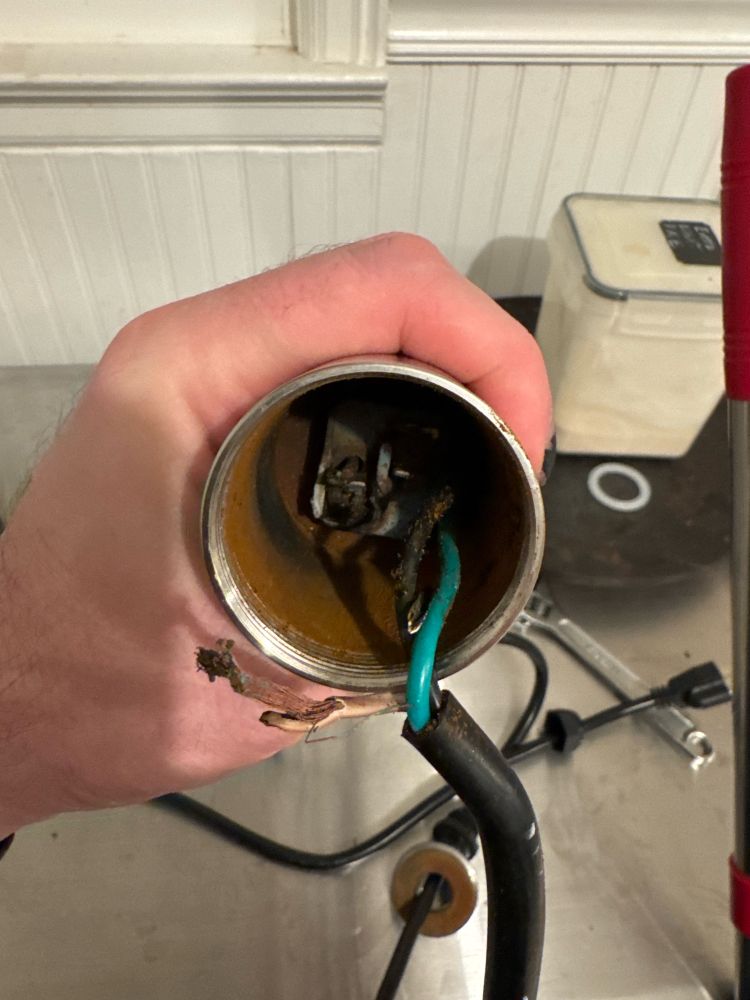 Interior of a burned out heating element. The wiring is very burned. 