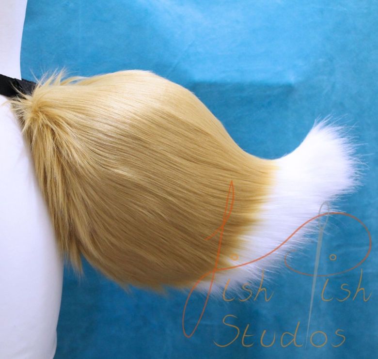 Chibi demon fox girl tail in caramel and white lux faux fur. Handmade in the UK by FishPish Studios 
