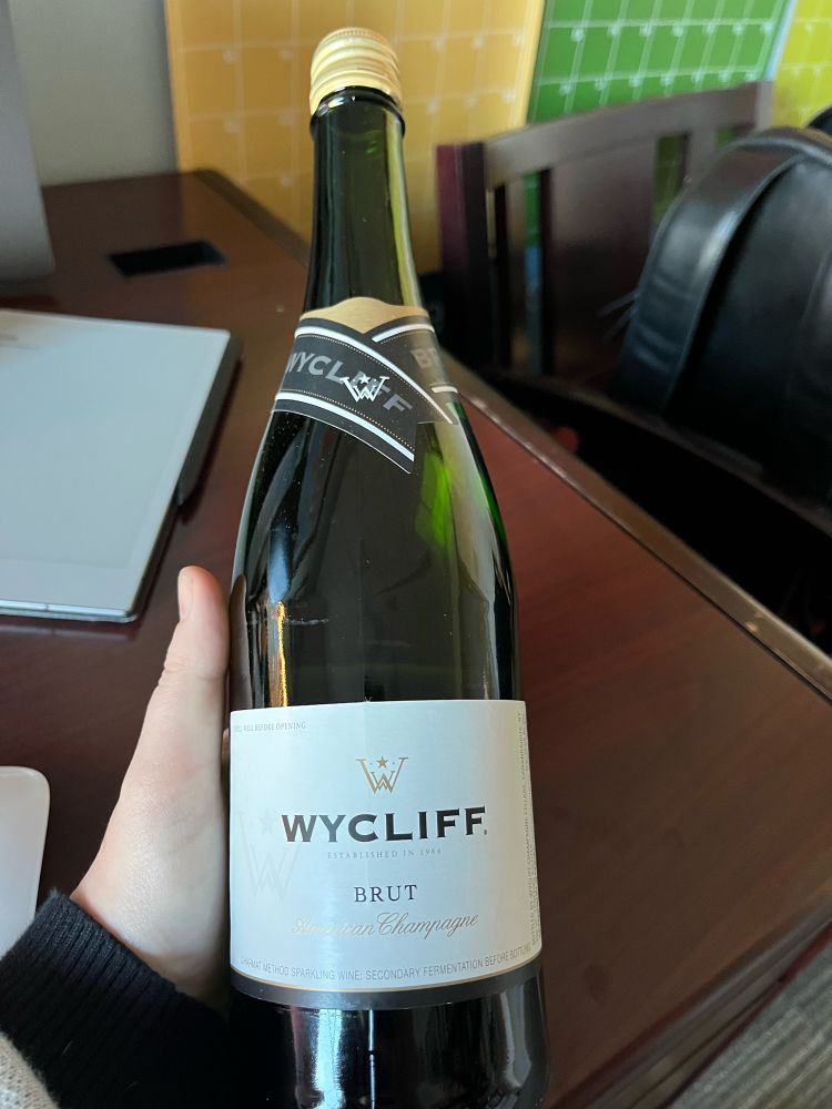 Bottle of Wycliff champagne with a screw top