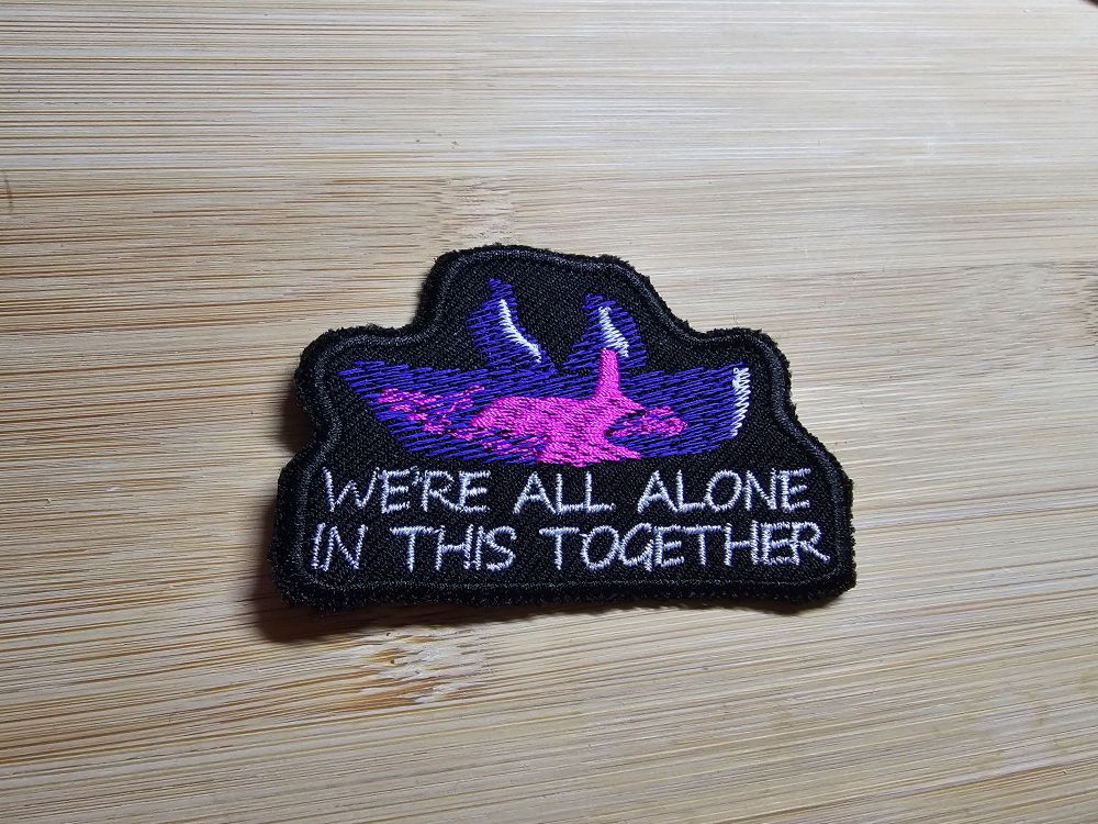 "We're all alone in this together" by Dave, fan-made bootleg patch featuring the boat from the middle of the album cover with the album's title beneath. 