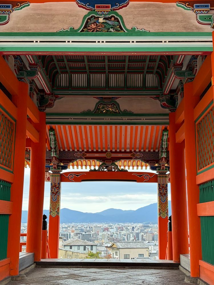A picture of Kyoto shot through a temple 