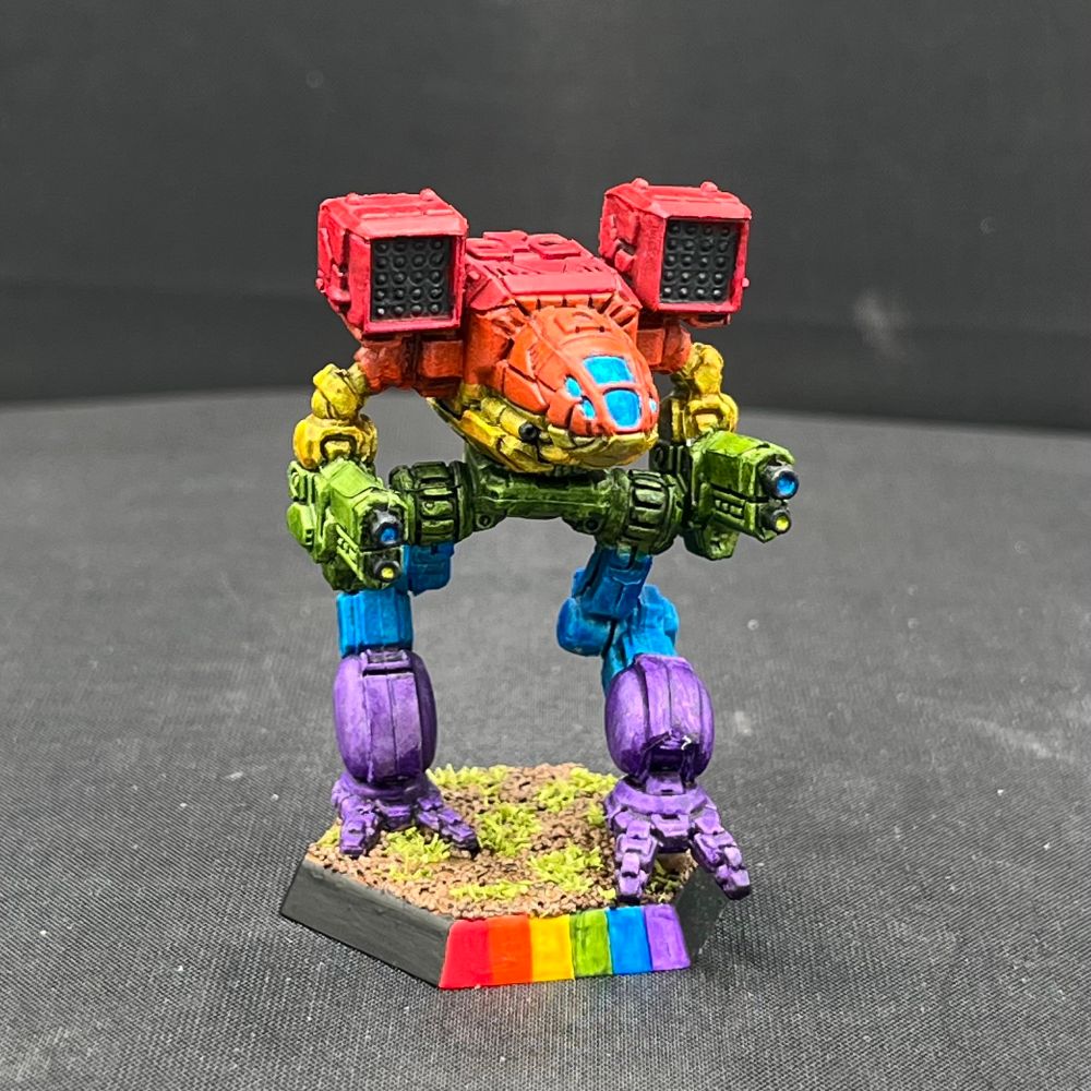 a front view of a CGL Battletech Timber Wolf model painted in horizontal rainbow stripes of red, orange, yellow, green, blue, and purple