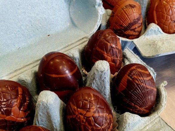 Niko B swirled handmade chocolate eggs in cardboard egg box