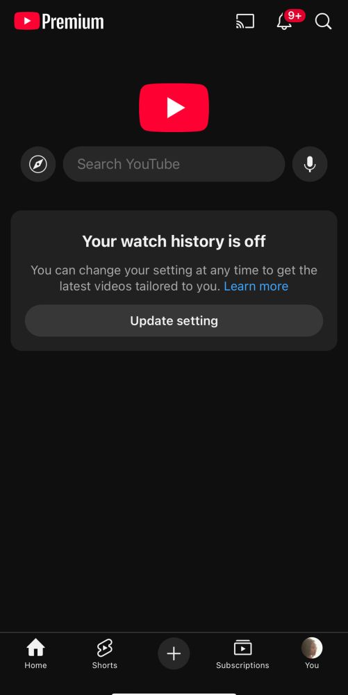 Screenshot of a YouTube home page with no videos. Screen says “your watch history is off”