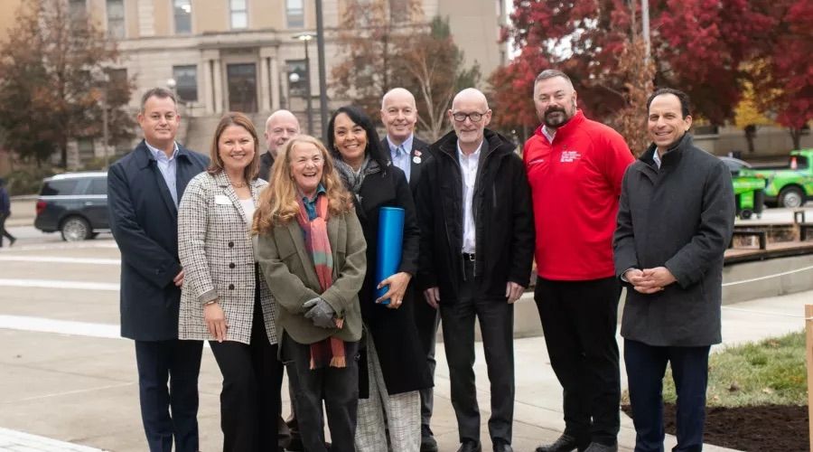 Speakers at the LOUMED Commons opening celebration gather together for a commemorative group photo on November 19, 2025. The group includes LOUMED Executive Director Nadareca Thibeaux, UofL President Gerry Bradley and Louisville Mayor Craig Greenberg, and the Christina Lee Brown Envirome Institute’s Ted Smith, among others.