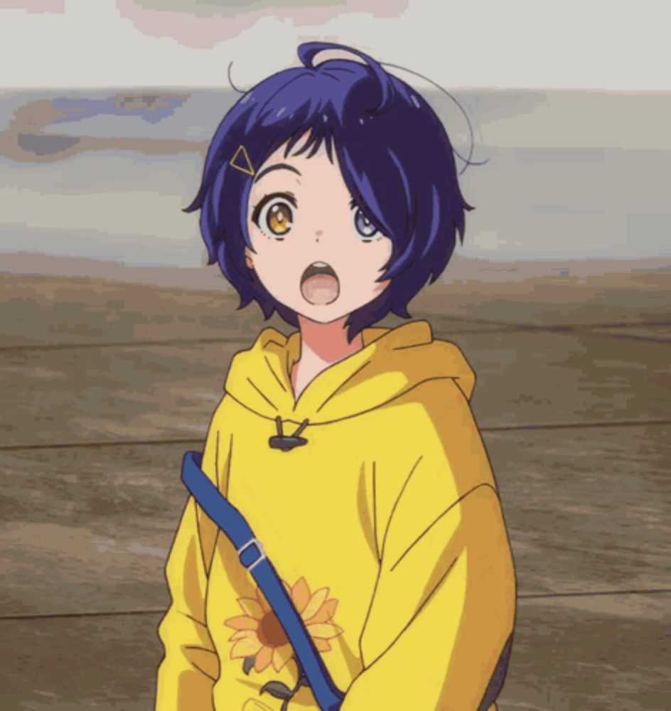 a girl in a yellow hoodie has a blue strap around her shoulder