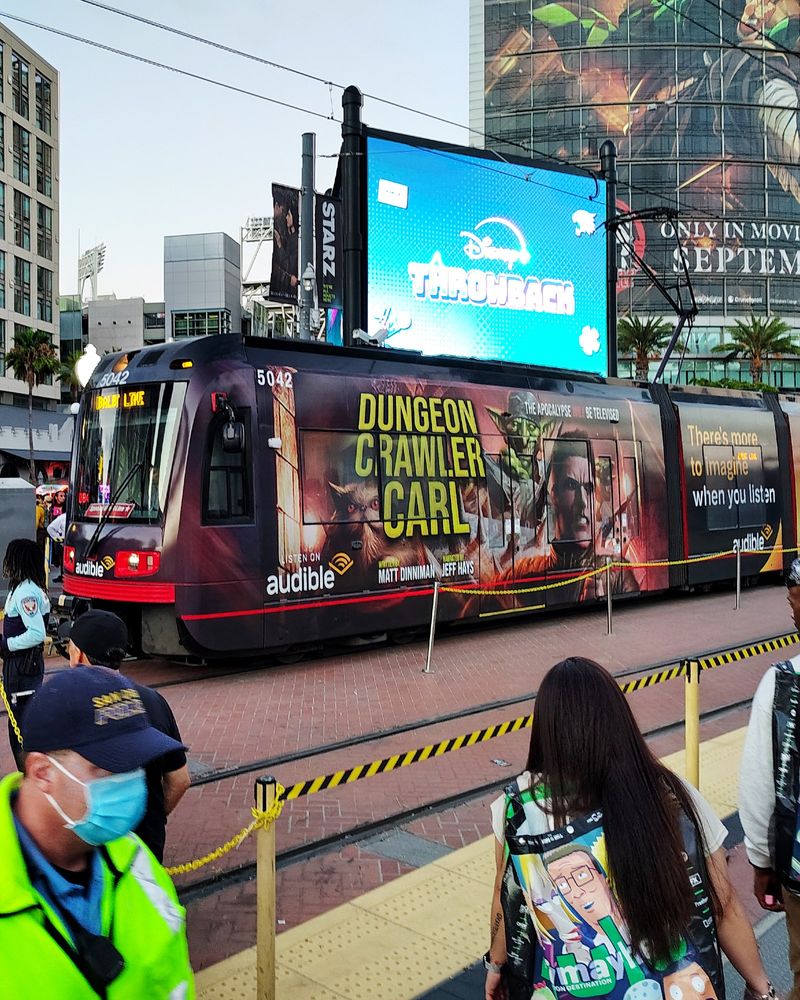 Photo of Dungeon Crawler Carl promo on a train car.
