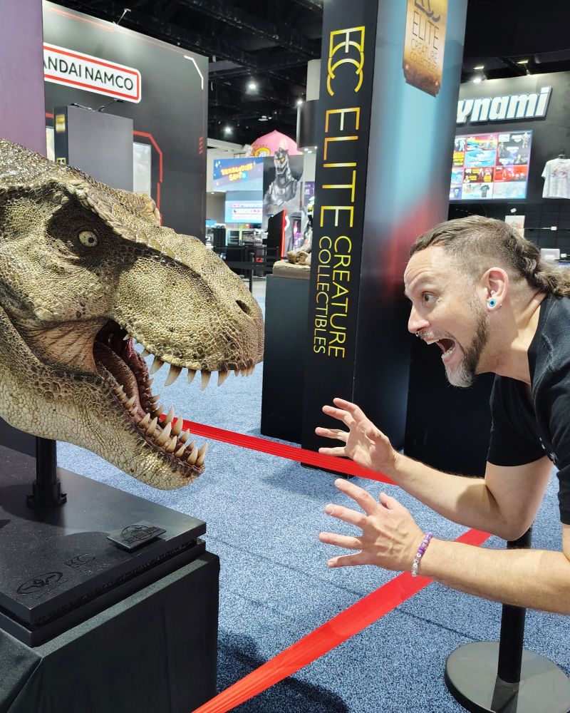 Photo of me vs. a T-rex statue.