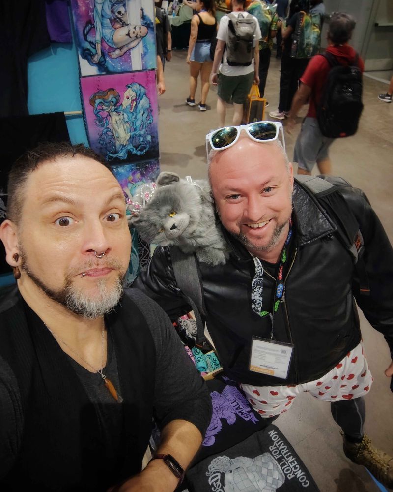 Photo of me with Dungeon Crawler Carl cosplayer (and Princess Donut!).