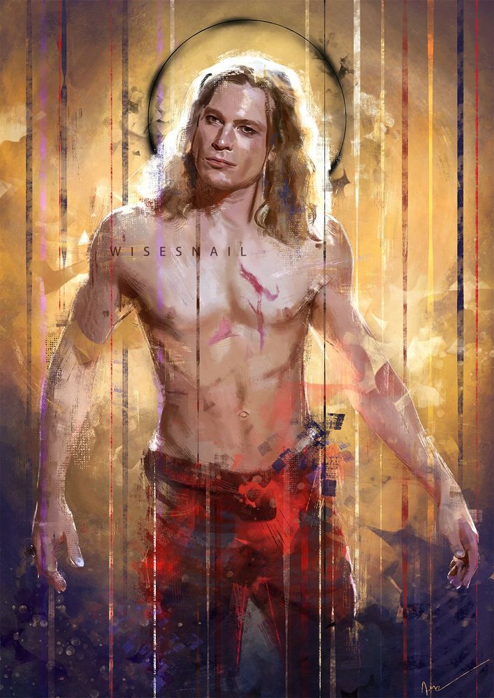 Portrait of Sam Reid as Lestat. He is wearing a pair of red and purple trousers, and his torso is bare. He is looking straight ahead, with slightly open arms. The backgrounds is yellow, dark orange and purple, and a black halo surrounds his head.