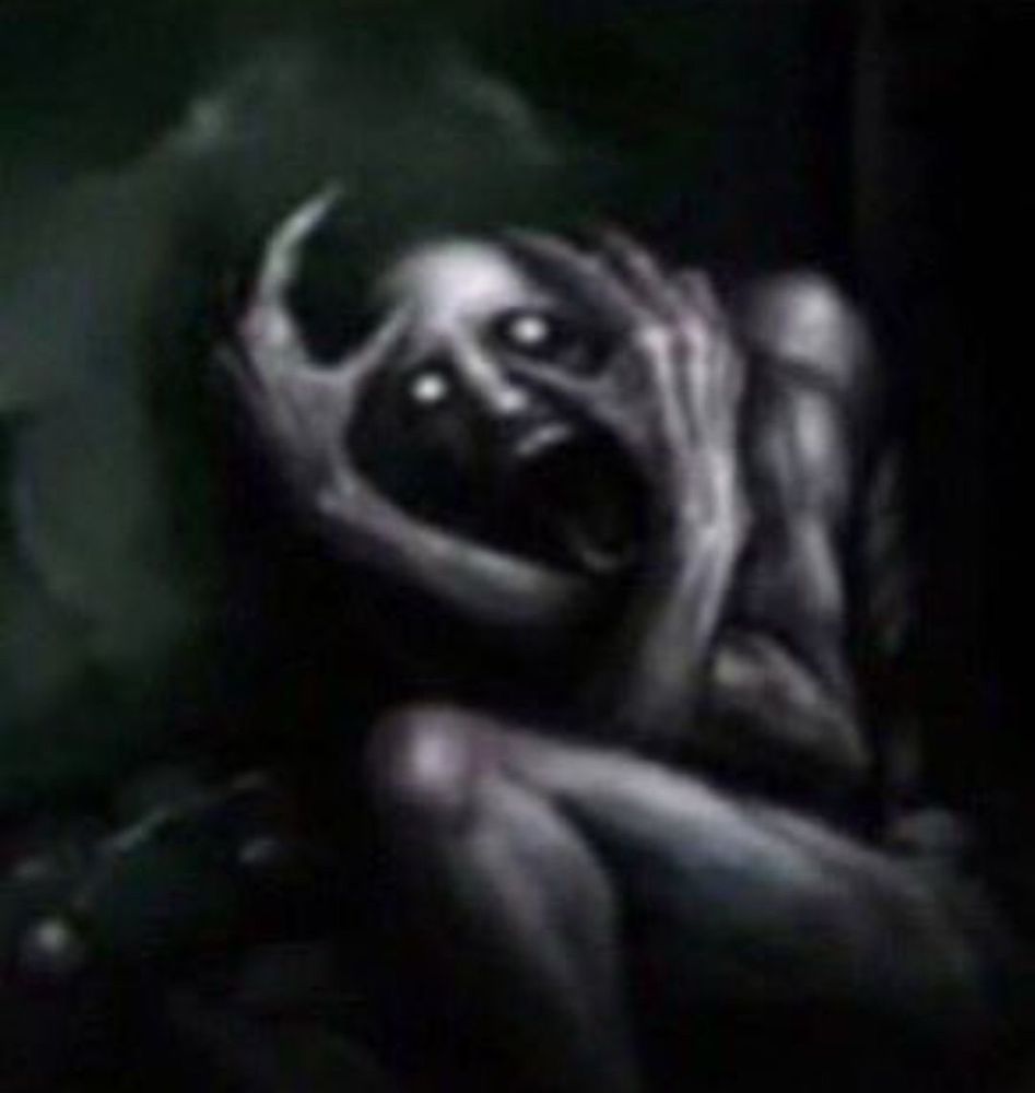 a dark creature, huddling in the corner screaming in horror