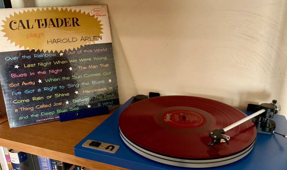 A turntable with a red Fantasy LP (Cal Tjader playing the music of Harold Arlen)