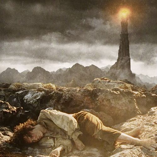Frodo Baggins, collapsed on the ground behind a rock ridge. The eye of Sauron is in the background- not looking at him right now, but it could at any time.