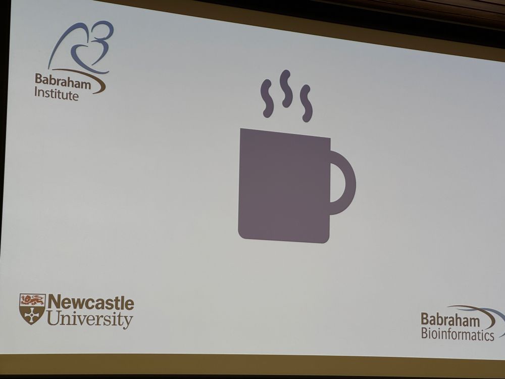 Image of slide with a coffee cup and logs of Newcastle University and Babraham institute. 