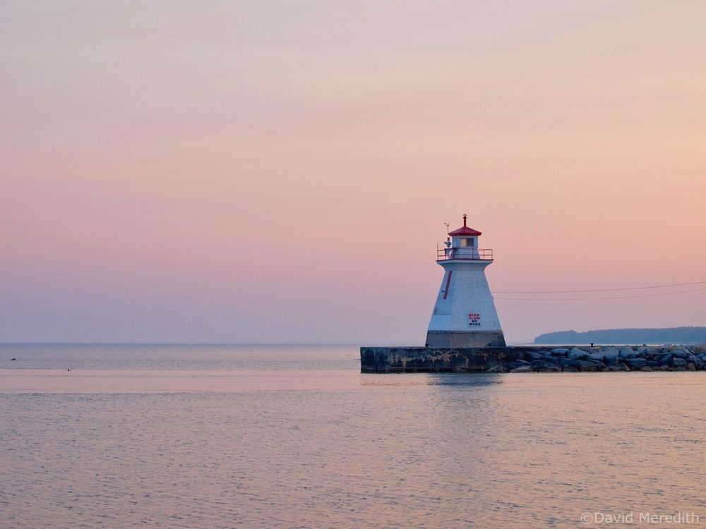 Range light at the mouth of the Saugeen River on the Lake Huron shoreline in Southampton, Ontario, at dawn. 