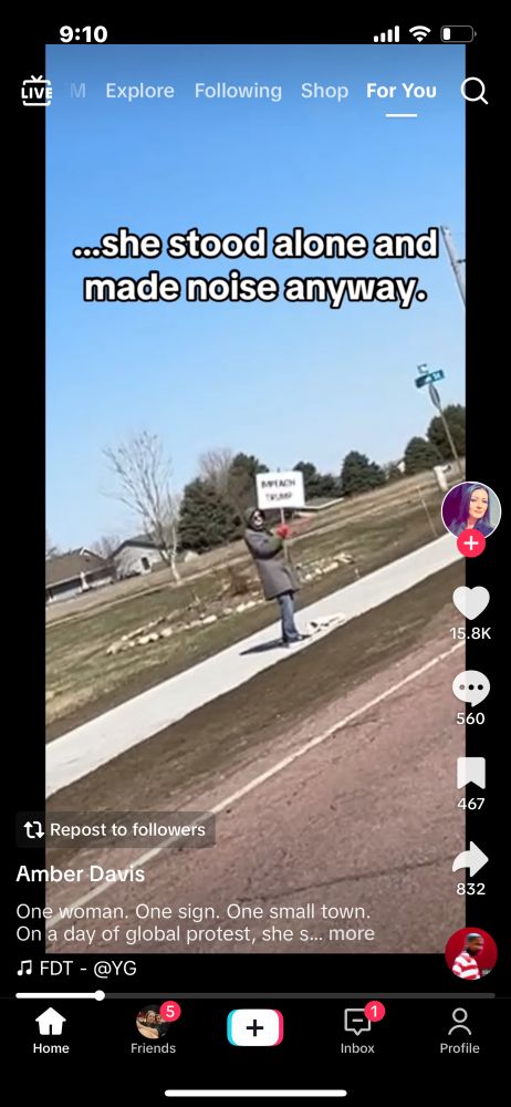 Image of one woman standing on the sidewalk in crooks SD holding a sign that reads "impeach Trump" captioning on the image reads "she stood alone and made noise anyway"