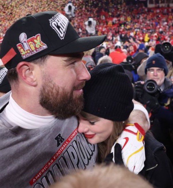 taylor hugging Travis at the afc championship game 