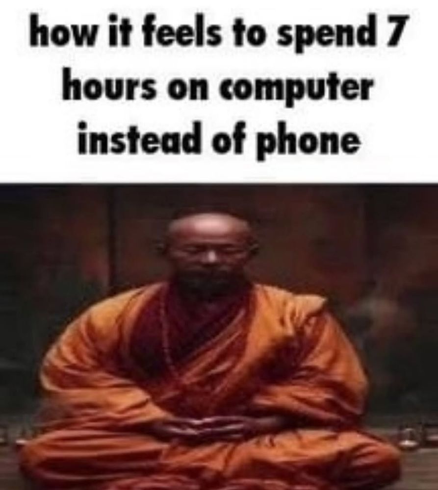 man in orange robes with peace in the state of his mind. top caption saying: "how it feels to spend 7 hours on computer instead of phone"