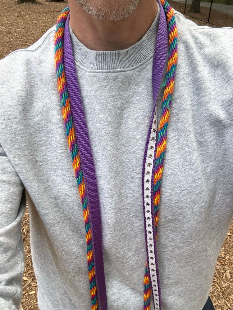 Me with two leashes around my neck. The leashes are for the dogs. Not for me. 