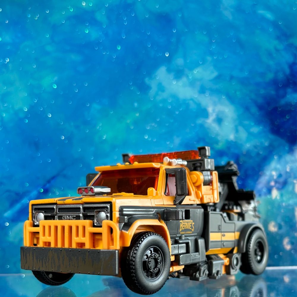 Transformers Rise of the Beasts Studio Series Battletrap photographed in vehicle mode.