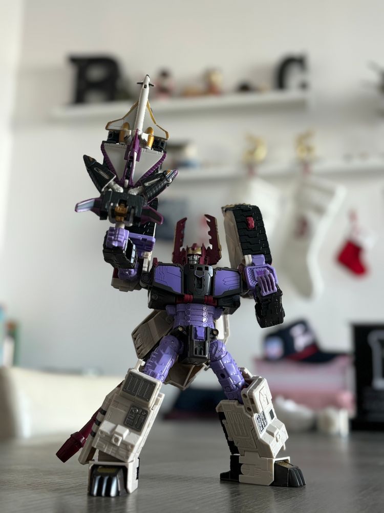 Transformers Legacy Armada Universe Galvatron in robot mode with the original Armada Air Assault Minicon team in saber mode.