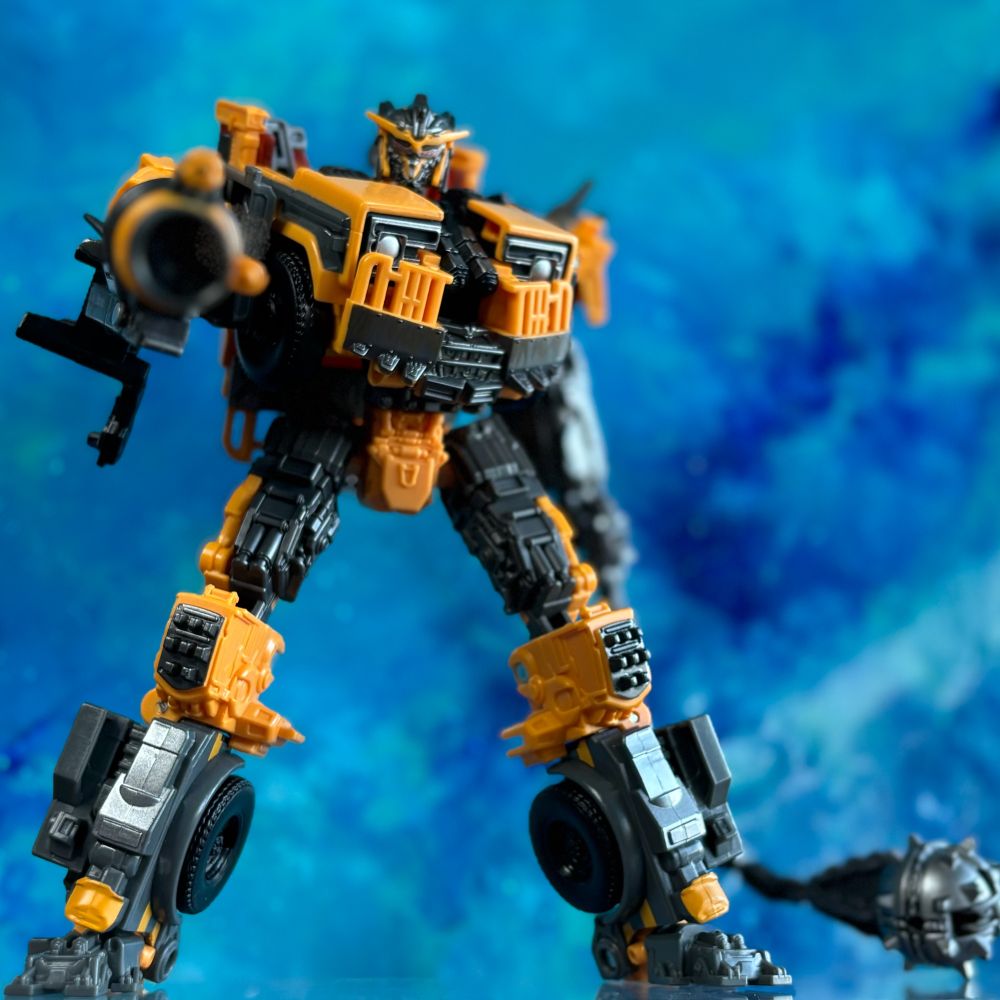 Transformers Rise of the Beasts Studio Series Battletrap photographed in robot mode with DNA design upgrades.