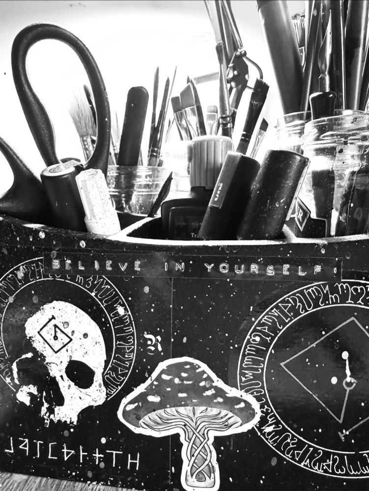 My art brushes and pen box. With a sticker that says “believe in yourself “