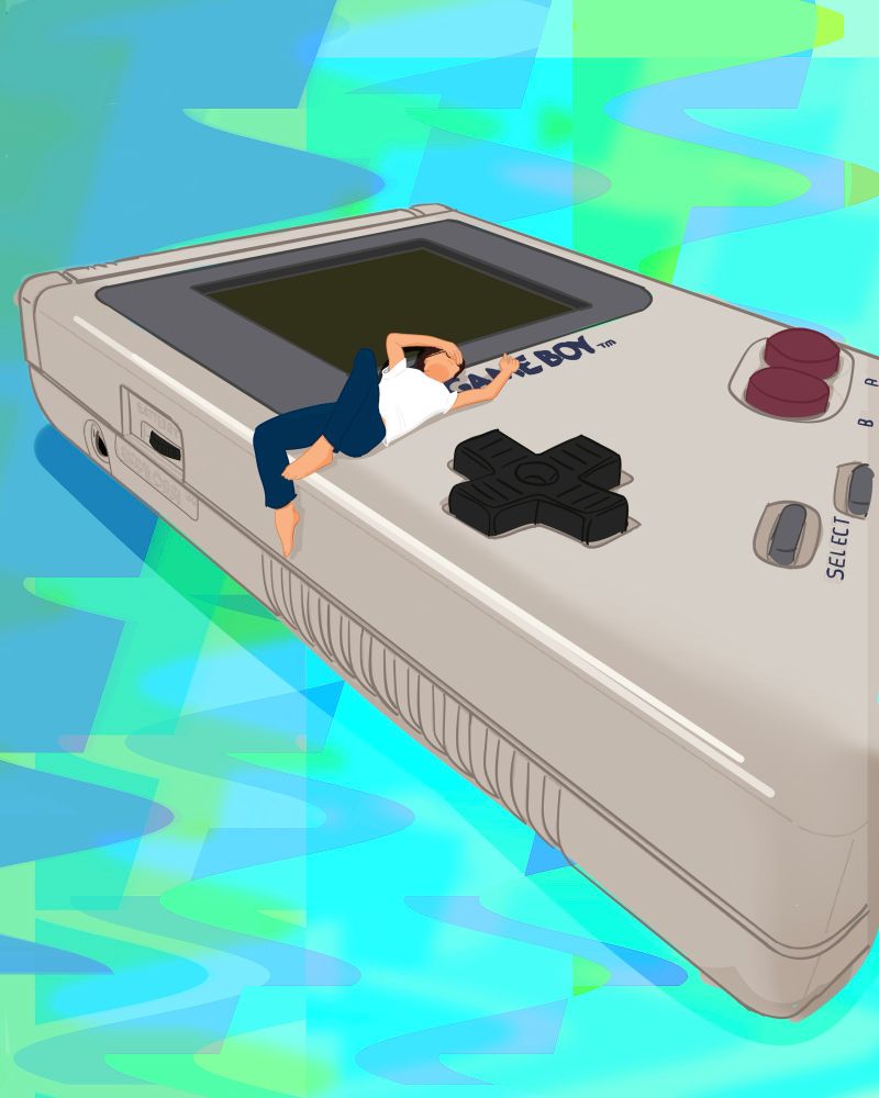 Small man in jeans and a t-shirt laying on top of a gameboy arm draped over his face, one leg dangling off the edge, the other on the surface knee bent towards his head. 