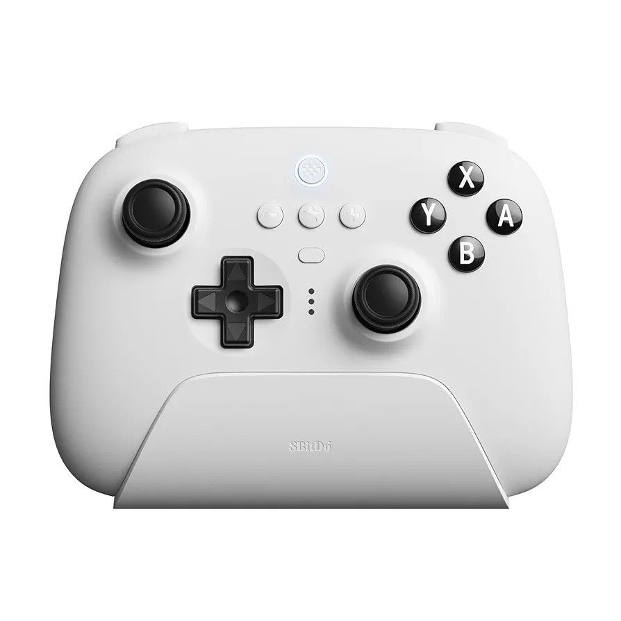 The 8BitDo Ultimate, a different 8BitDo controller in all white with some black buttons. 