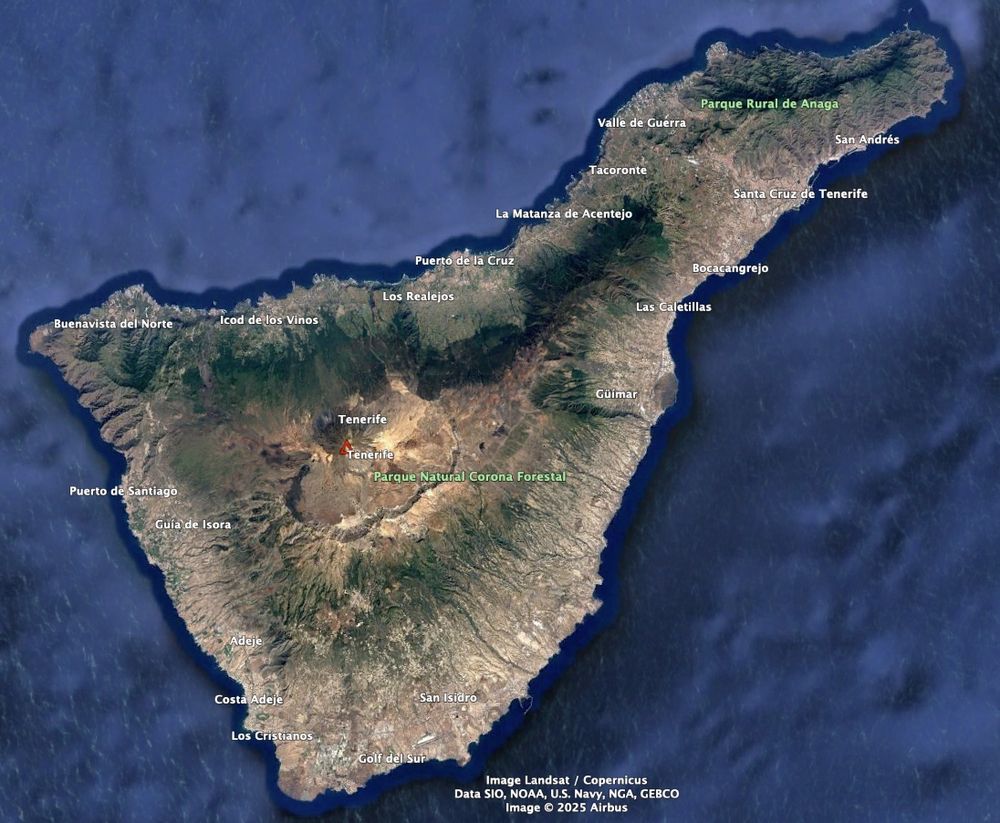 A Google Earth satellite image of Tenerife Island and the surrounding ocean, with the summit of Mt Teide labelled with a red triangle.