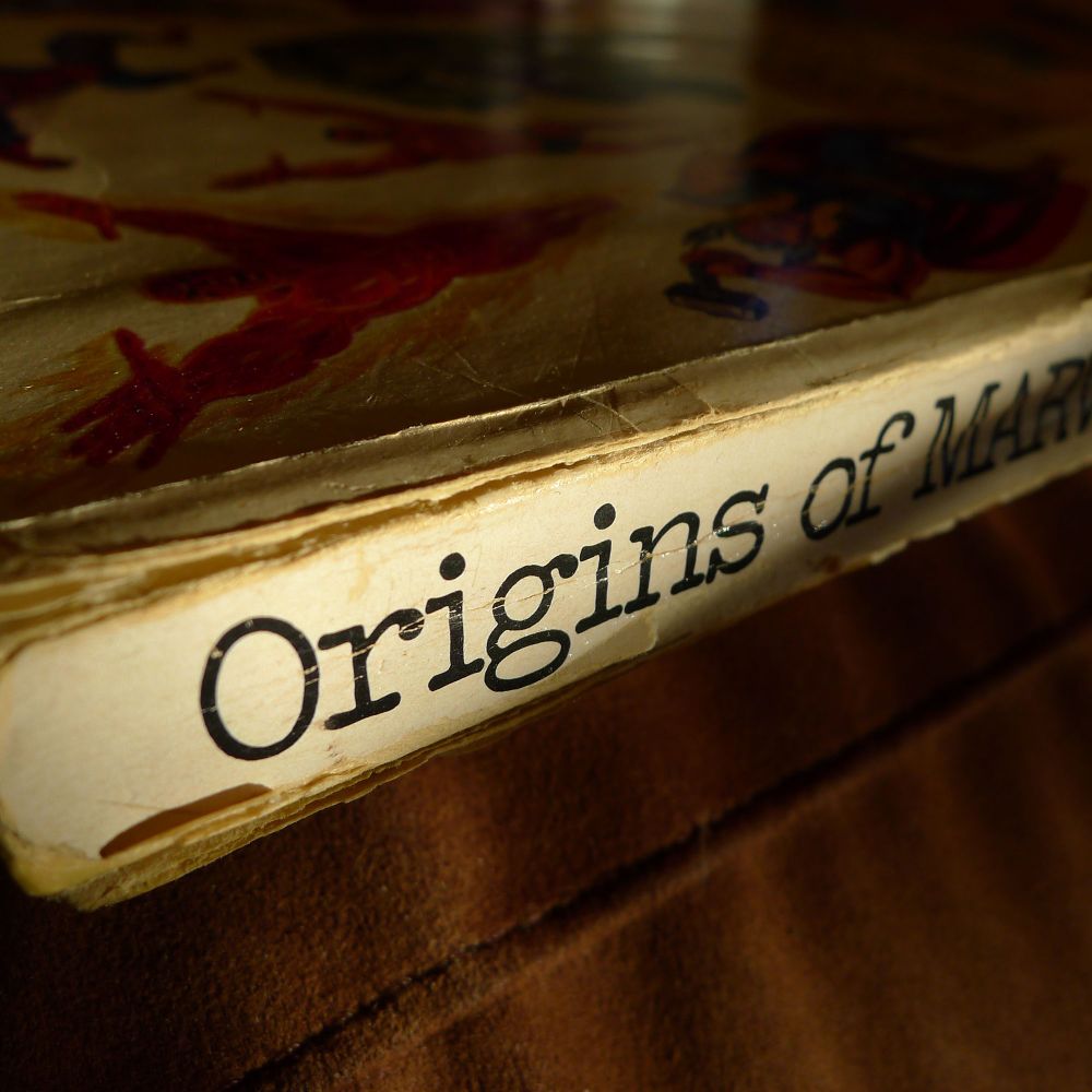 Spine of a battered copy of Origins of Marvel Comics