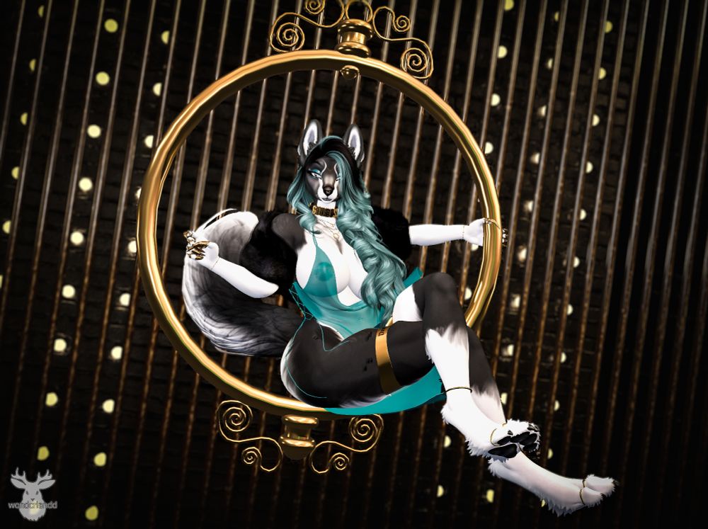 black and white canine perched on a gold hoop in the air, dressed in a sheer teal dress with matching hair and gold jewelry.

This is a blog post.
Get yours at Abnormality- OPEN TODAY through the 28th.