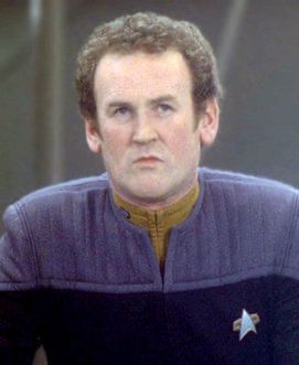 Miles O’Brian from Star Trek.  Looking stern or concerned. 