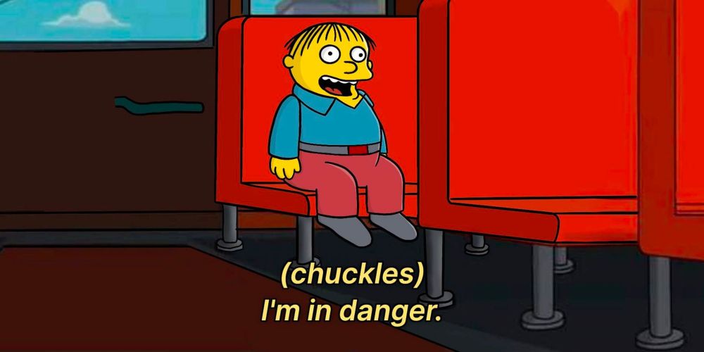 Ralph Wiggum from the Simpsons, staring straight ahead with his mouth open. Closed captioning reads "(chuckles) i'm in danger"