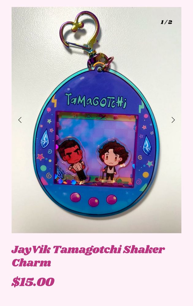 Screenshot of jayvik tamagotchi shake charm. The tamagotchi is blue and purple and has the runes framing the screen