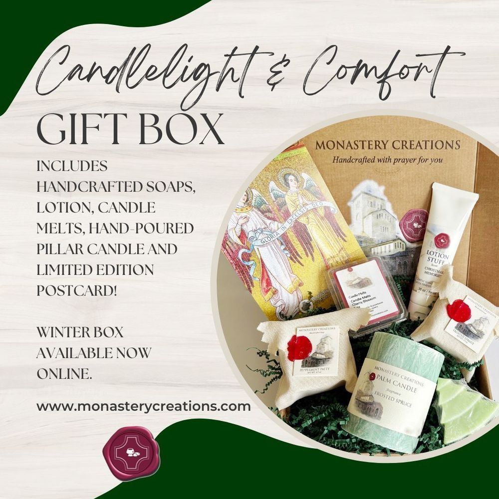 [PIC] Monastery Creations gift box filled with two square soaps and one shaped like a Christmas tree, a Lotion Stuff, a box of candle melts, a short green pillar candle and a postcard featuring a photo of angel mosaics [TEXT] Candlelight and Comfort Gift Box. Includes handcrafted soaps, lotion, candle melts, hand-poured pillar candle and limited edition postcard! Winter box available now online. Shop Monastery Creations dot com.